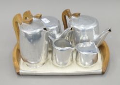 A Picquot Ware tea and coffee set. The tray 39.5 cm wide.