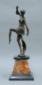 An Art Deco-style bronze of a dancing girl on marble plinth base. 46 cm high.