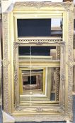 A large quantity of various picture frames. The largest 144 x 84 cm.