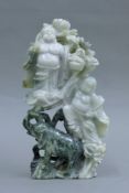 A Chinese hardstone carving of Buddha with elephant. 26 cm high.