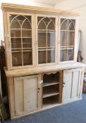 A 19th century and later pine dresser. 194 cm wide x 229 cm high x 31 cm deep.