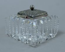 A sterling silver lidded cut glass inkwell. 10.5 cm wide.