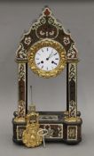 A 19th century boulle-work portico clock, the dial inscribed Leroy A Paris. 56.5 cm high.
