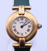 A Must de Cartier Argent Vermeil quartz ladies' wristwatch with associated strap, Colisee model,