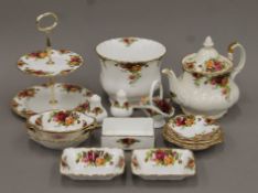 A quantity of Royal Albert Old Country Roses pattern porcelain. The teapot 20 cm high.