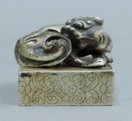 A Chinese silver-plated dog-of-fo seal. 5 cm high.