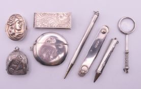 A quantity of small silver items, including a vesta, a 'baby' rattle pendant,