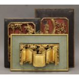 A framed Chinese carving and two unframed Chinese carvings. The former 23 x 36 cm overall.