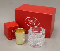 A boxed Baccarat glass candle holder and candle. The former 10.5 cm high.