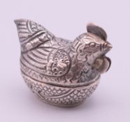 A silver trinket/betel nut box formed as a chicken. 3.8 cm high.