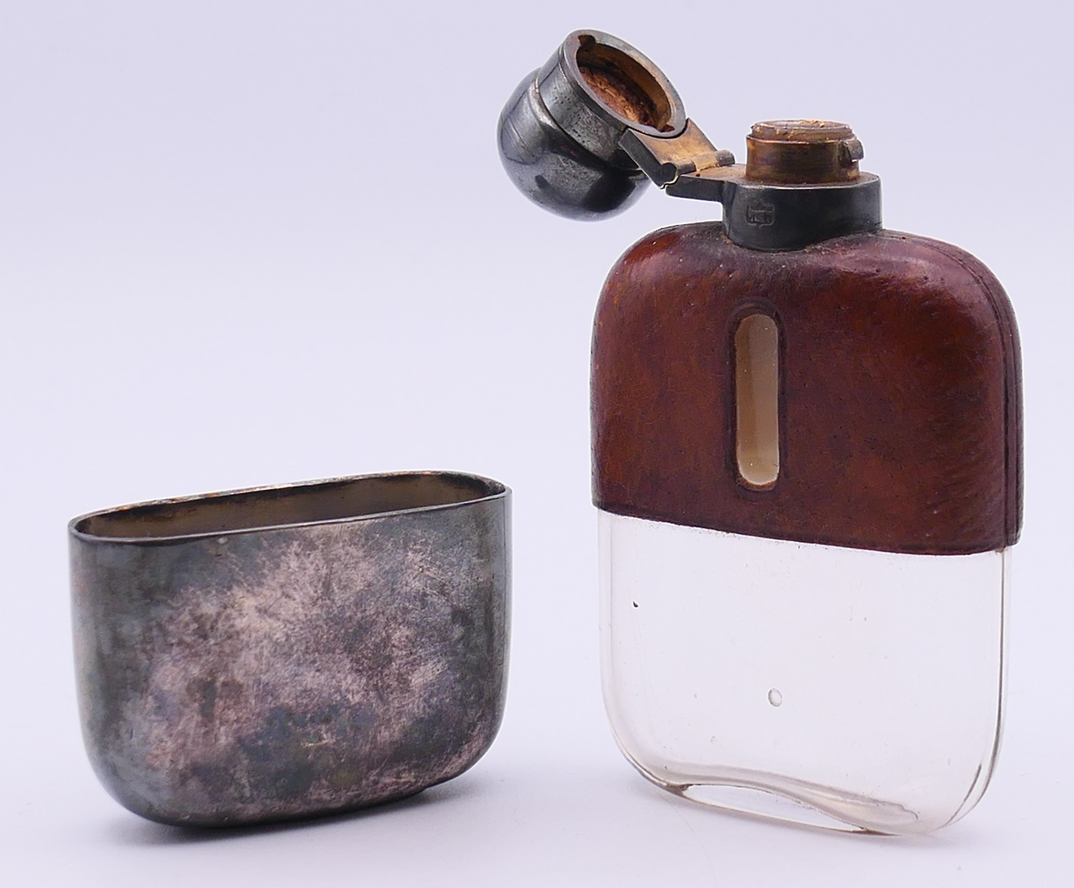 A James Dixon & Son small leather-clad silver plate mounted hip flask. 10.5 cm high. - Image 3 of 6