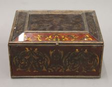 A decorative glass-panelled casket. 26.5 cm wide.