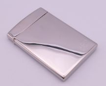 An Aquascutum polished metal card holder stamped AMP Oval, boxed and with cloth case. 9.5 x 6 cm.
