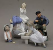 A Royal Doulton The Lobster Man and two Lladro porcelain figures (one damaged).