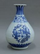A Chinese blue and white porcelain vase. 31 cm high.
