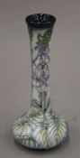 A boxed Moorcroft vase. 20.5 cm high.