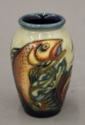 A boxed Moorcroft vase. 10.5 cm high.