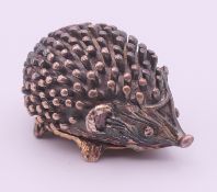 A silver box formed as a hedgehog. 3.7 cm long x 2 cm high.
