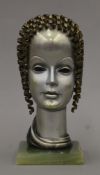 STEFAN DAKON (1904-1997) Austrian (AR), a painted and patinated bronze sculpture of a female head,