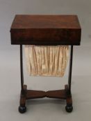 A Victorian mahogany work table. 51 cm long.