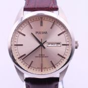 A Pulsar gentlemen's wristwatch. 4 cm diameter including crown.