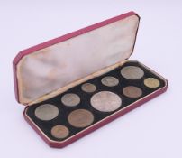 A boxed 1953 Elizabeth II Coronation coin set, comprising: farthing, halfpenny, penny, threepence,