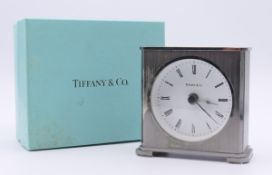 A boxed Tiffany & Co Quartz-Werk desk clock, in Tiffany box. 8 cm high, 7.8 cm wide, 4.2 cm deep.