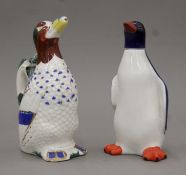 A Russian porcelain ewer formed as a duck and a Russian porcelain decanter formed as a penguin.