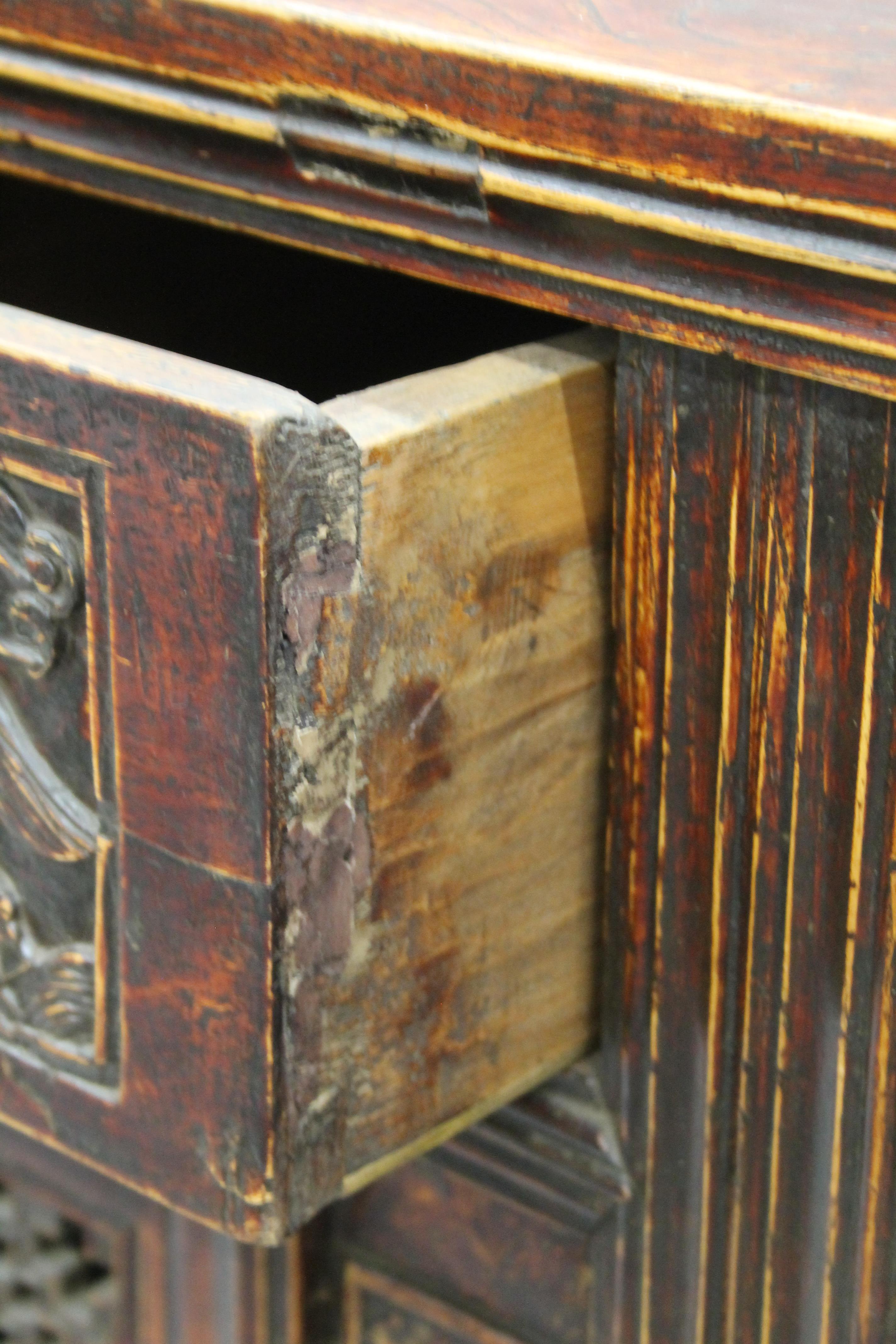 A 19th century Chinese elm side cupboard. 111 cm wide x 85 cm high x 79 cm deep. - Image 6 of 8
