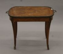 A late 19th century French ormolu-mounted side table. 78 cm long.