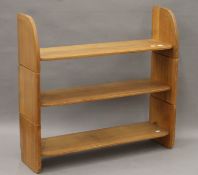 A set of pine stacking bookshelves. 79 cm wide x 75 cm high x 22 cm deep.