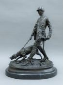 After P J MENE, a huntsman and hound bronze mounted on a marble plinth base. 46 cm high.