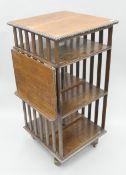 A Victorian oak revolving bookcase. 53 cm wide x 106 cm high.