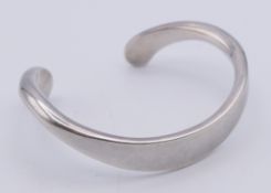 A Georg Jensen silver bangle, marked Georg Jensen, Denmark 925S, H10 A9.