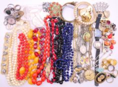 A box of various costume jewellery to include two silver St Christopher pendants, a silver locket,