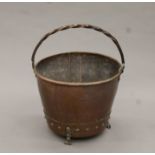 A Victorian copper coal bucket. 43 cm diameter.