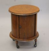 An early 20th century oak drinks cabinet. 59 cm high.