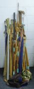 A large quantity of decorative rods, mainly split cane, by various makers.