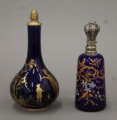 Two Victorian scent bottles, one with a silver top. The latter 11 cm high.