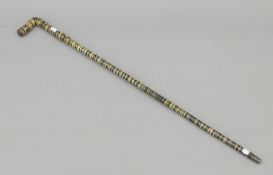 A Victorian segmented horn walking stick. 82 cm high.