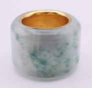 A gilt-lined jade archer's ring. 2.5 cm high.