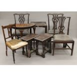Two oak joint stools, three mahogany dining chairs, two side tables and an inlaid chair.