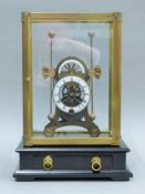 A grasshopper clock. 34 cm high.