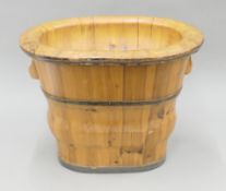 A Chinese elm baby bath. 50 cm wide.