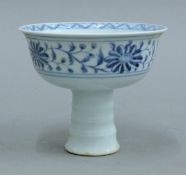 A Chinese blue and white porcelain stem cup. 9.5 cm high.