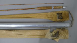 An 8' Hardy Bros C C de France Palakona split cane rod in maker's canvas sleeve and aluminium tube.