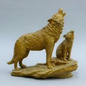 A bronze wolf group. 24.5 cm high.