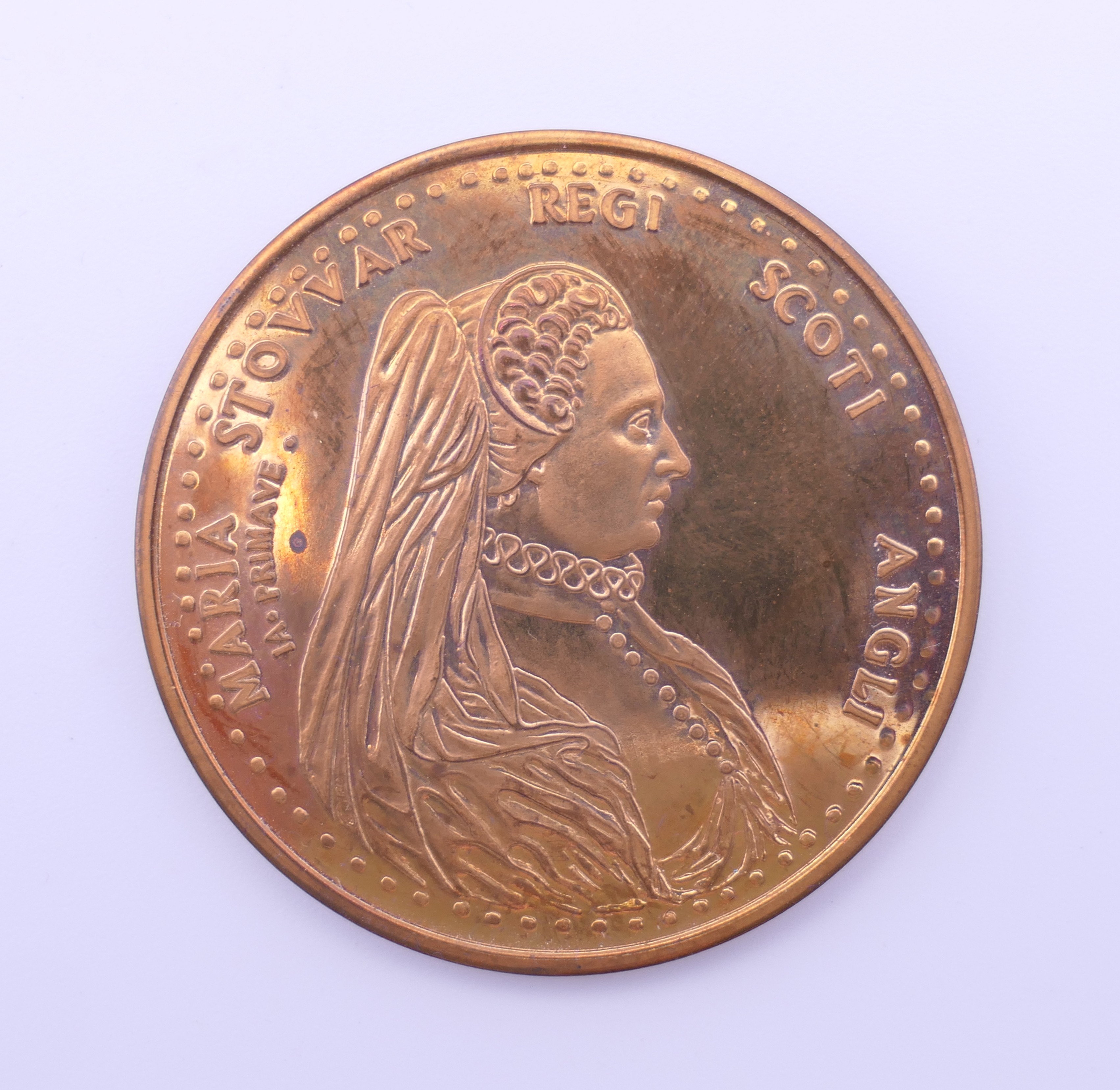 A boxed bronzed commemorative medallion celebrating Mary Queen of Scots produced by The Tower Mint.