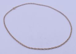 A 9 ct gold (tested) chain. 48 cm long. 6.4 grammes.