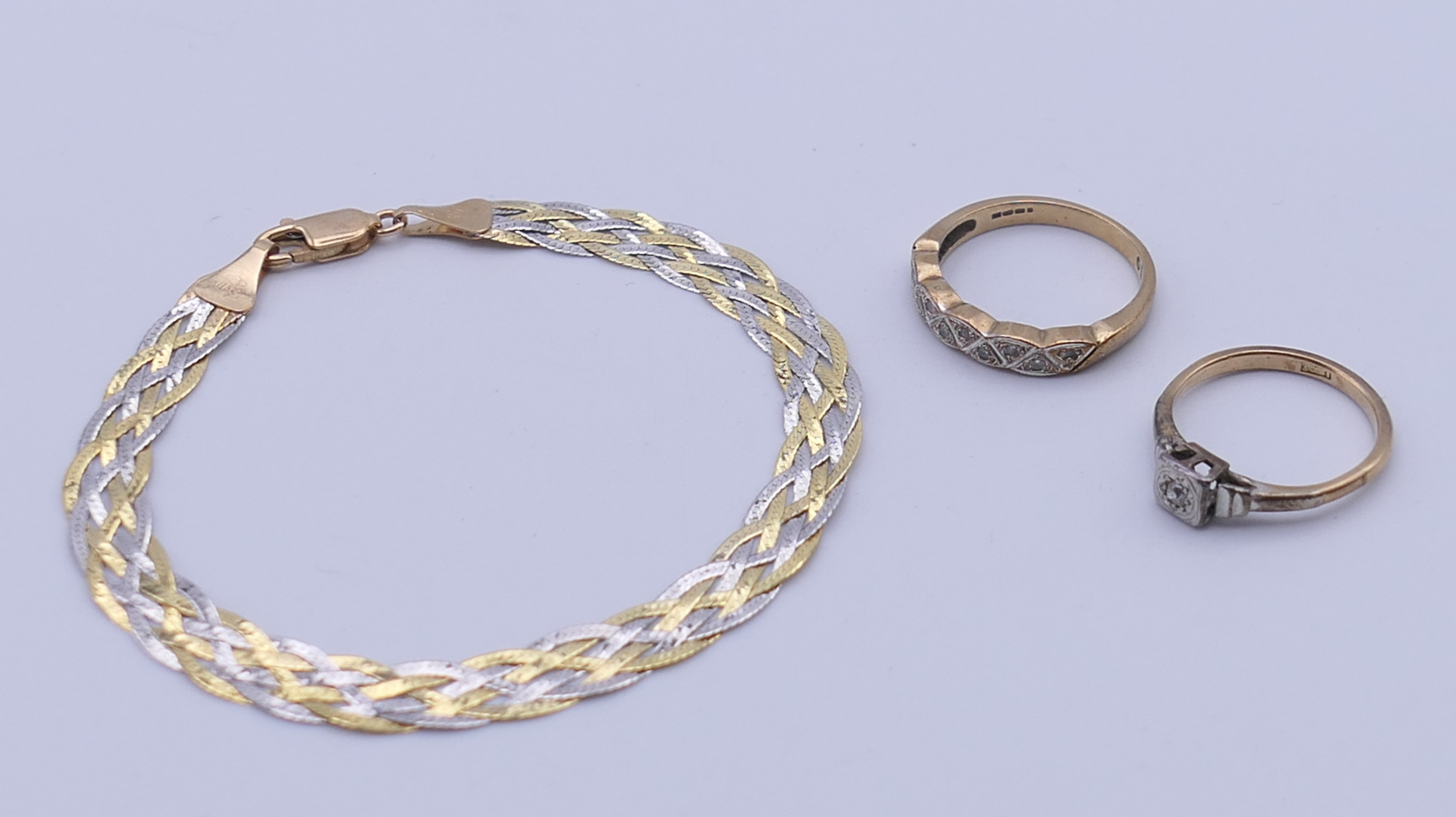A 9 ct gold bracelet (2.8 grammes), an 18 ct gold and diamond ring (2.